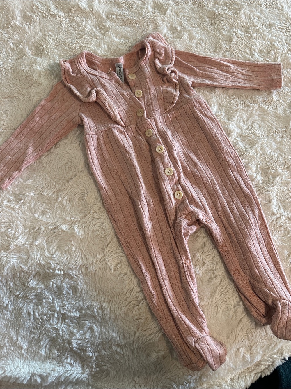 Ribbed Pink Footie One-Piece with Button Front and Ruffle Detail